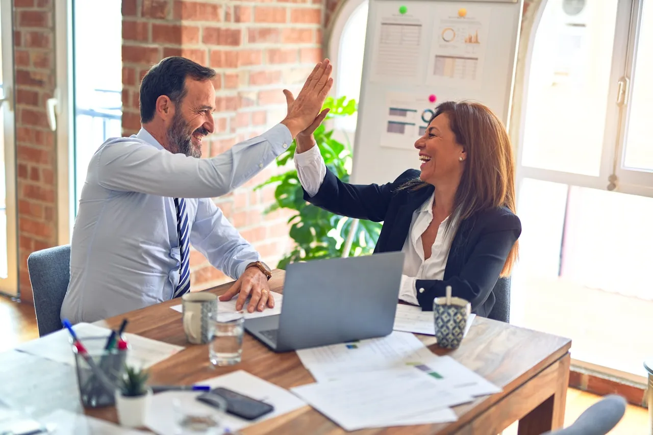 A Fort Worth small-business owner meeting with a Kingsley Commercial Capital lending advisor