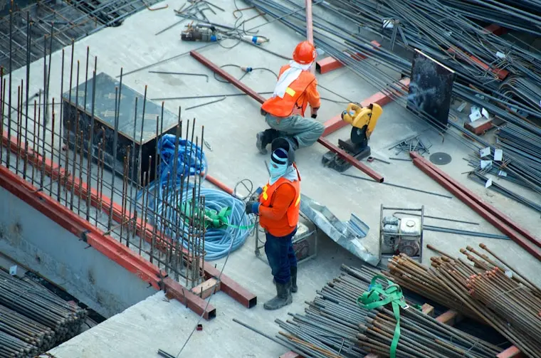 Worker operating equipment on a job site